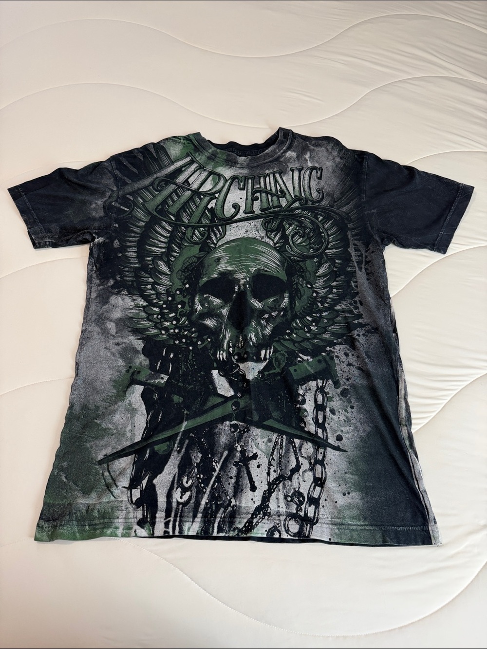 Archaic Black Tee with Green Skull Wing Graphic